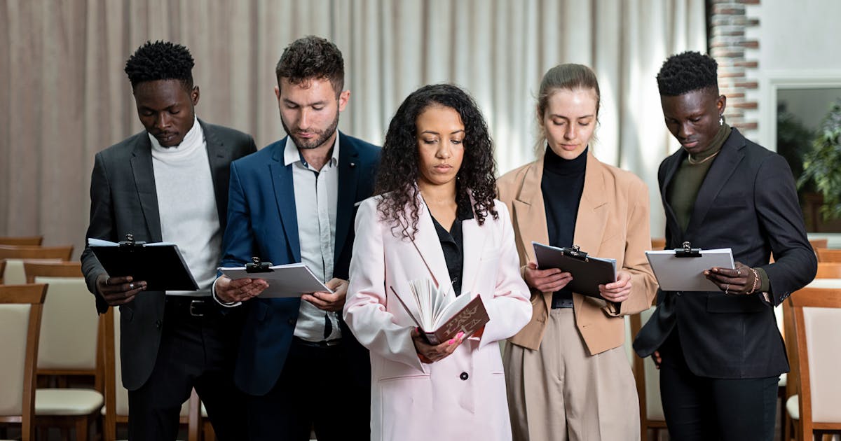 a group of business owners scaling their Business in 2025 Insurance Essentials for Growth - Photo by Mikhail Nilov httpswww.pexels.comphotopeople-having-a-deal-in-the-office-8730280