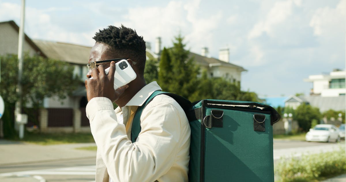 a seasonal employee discussing insurance with their boss on the phone