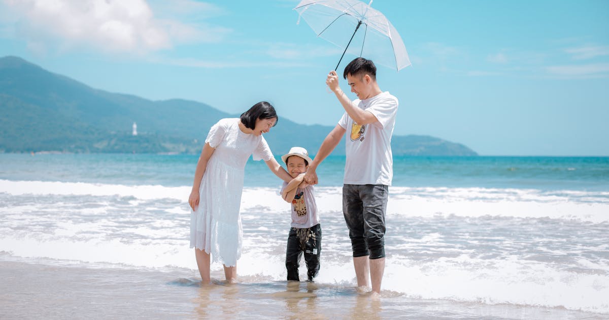 life insurance awareness month - Photo by Võ Văn Tiến httpswww.pexels.comphotohappy-family-at-da-nang-beach-vietnam-29980184