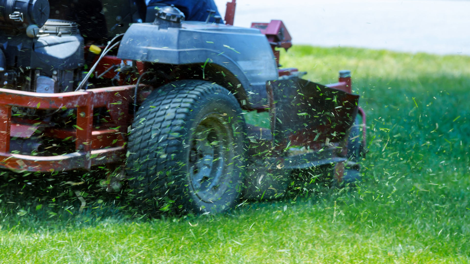 a landscaper on a ride on mower that needs insurance