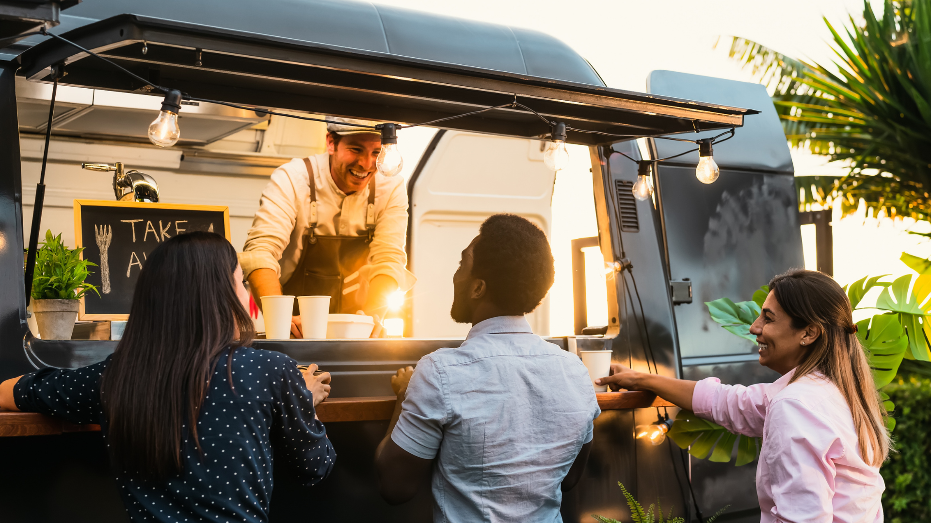 a food truck serving customers after securing the right insurance policies.